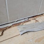 Damaged bathroom vinly flooring in worthing