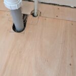 Installing a plywood sub-floor in a bathroom in worthing