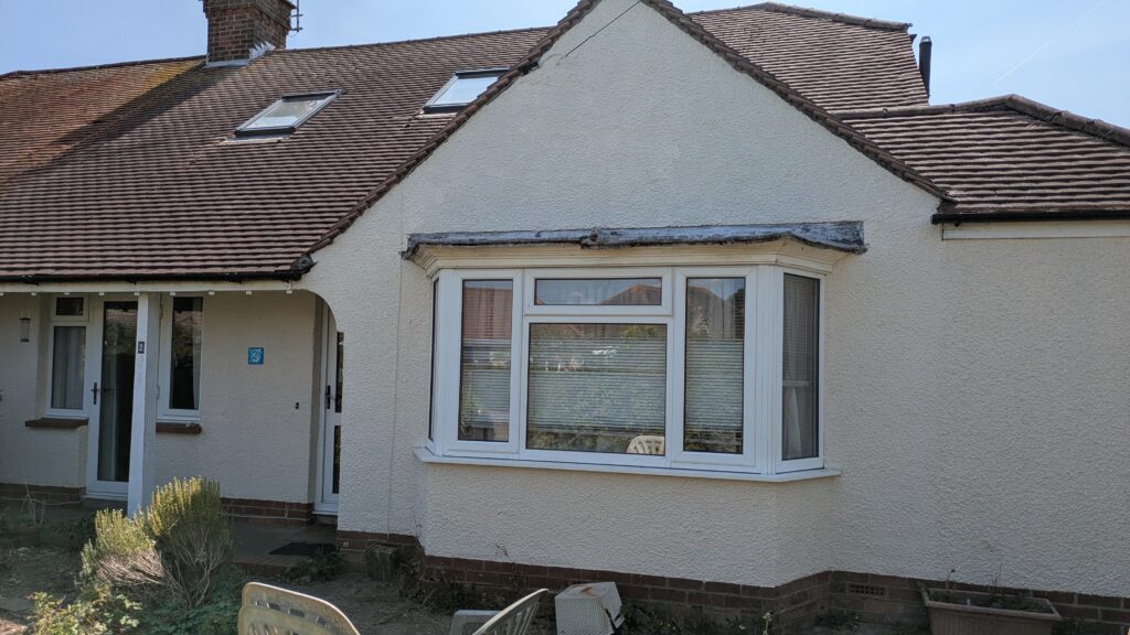 Freshly painted bungalow exterior using masonry paint on a a bungalow in Tarring, Worthing
