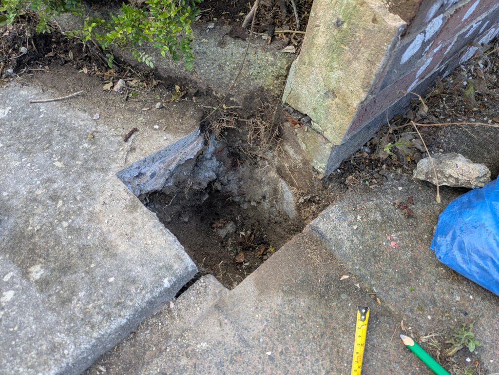 Neat removal of gate post without damaging the path
