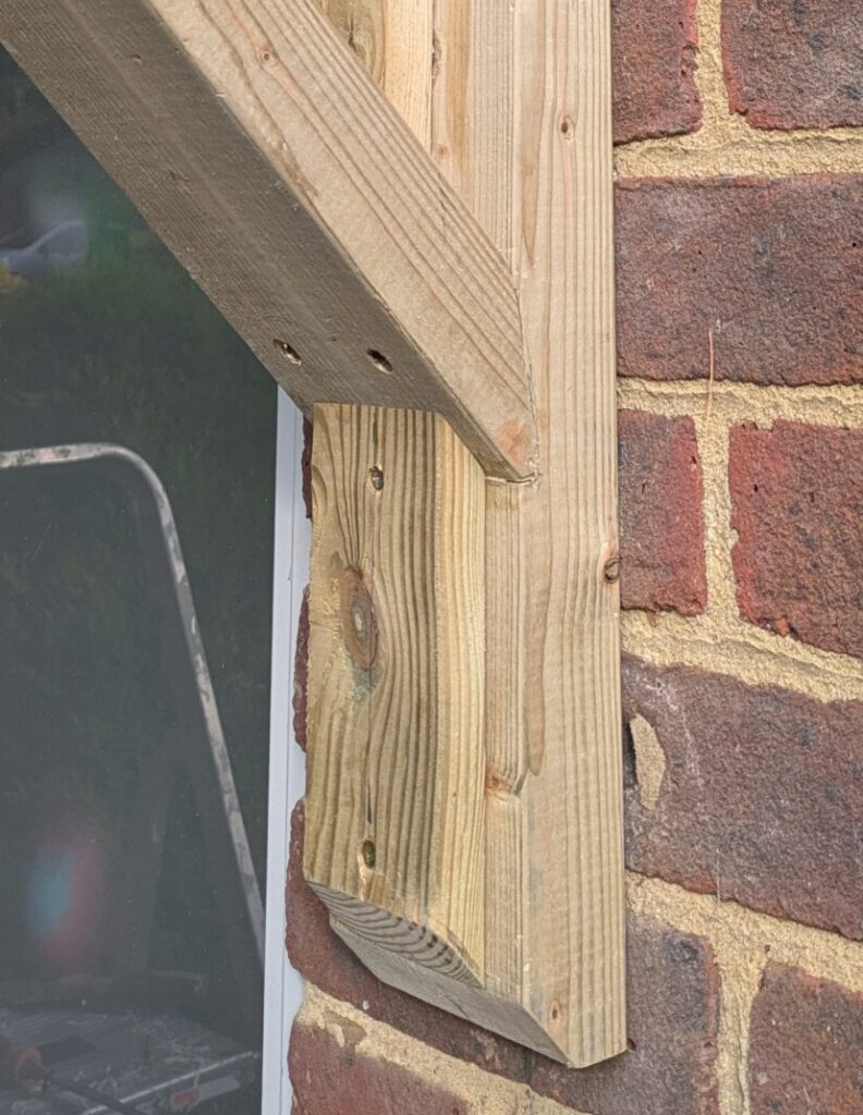 Notched timber joint for a wooden porch repair