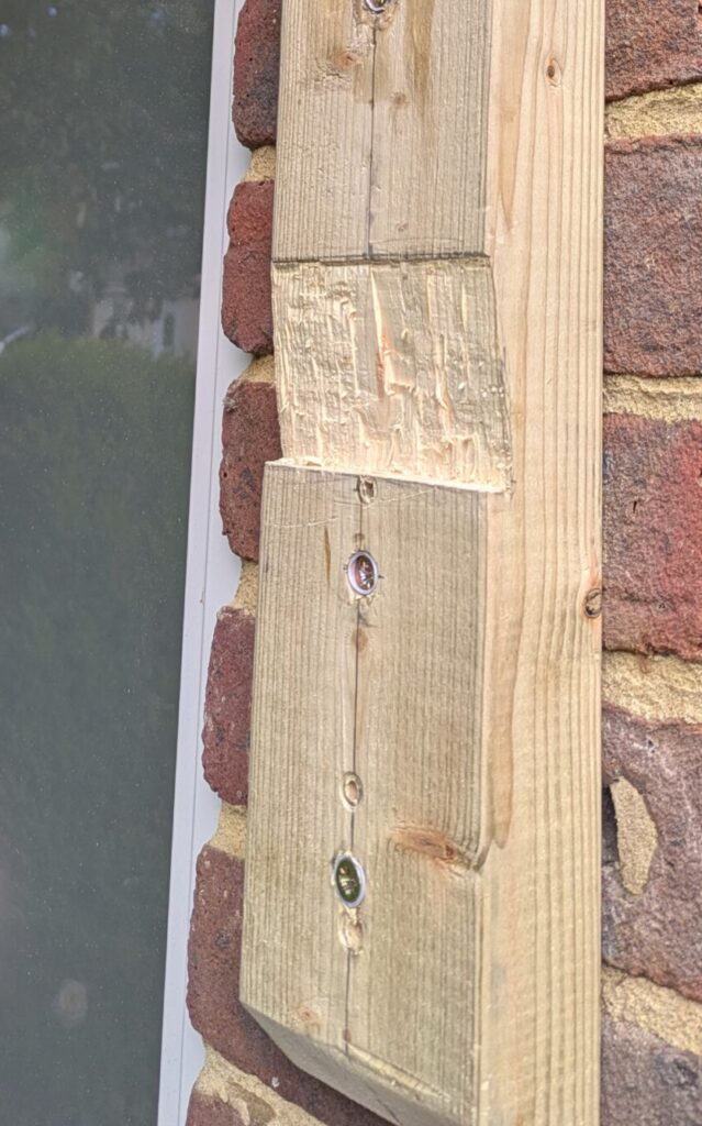 Notched timber joint for a wooden porch repair