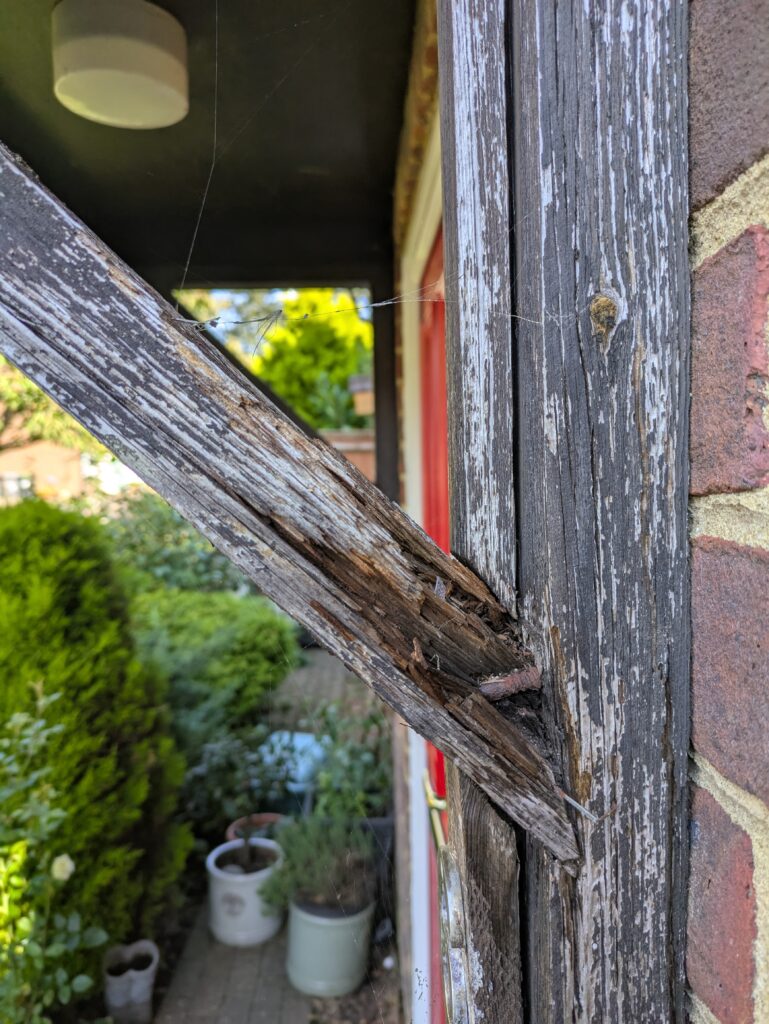 rotten timber on a wooden porch repair job